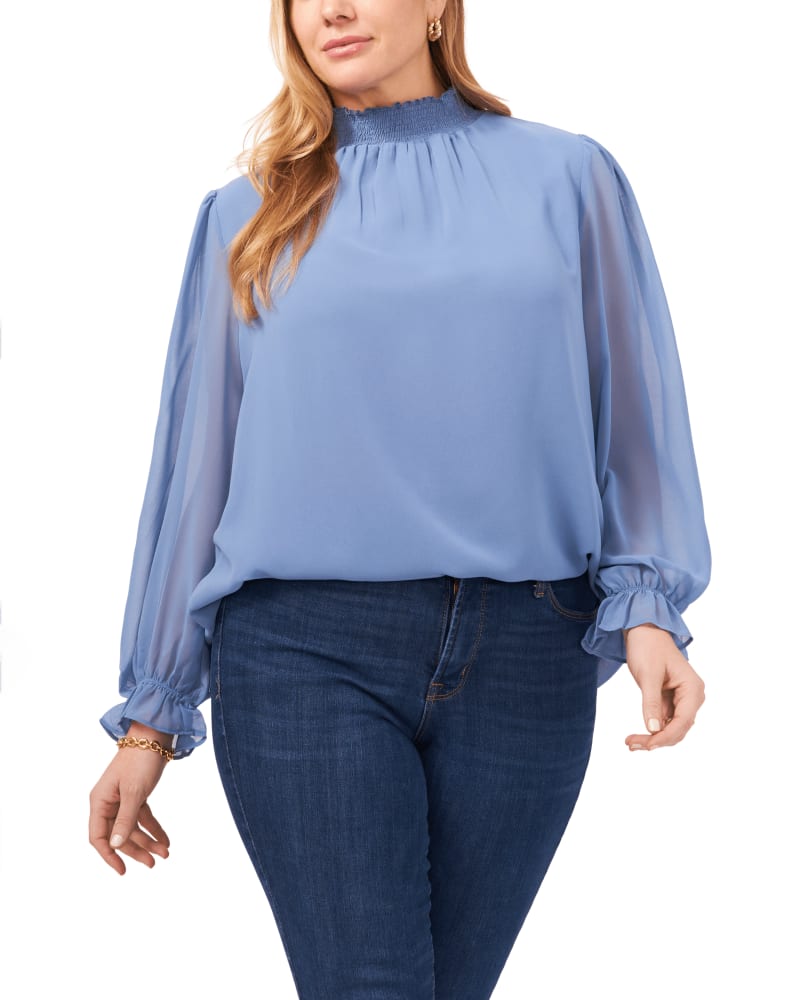 Front of a model wearing a size 0X Kiana Smock Neck Top in PORCELIN BLUE-414 by 1.State. | dia_product_style_image_id:262241